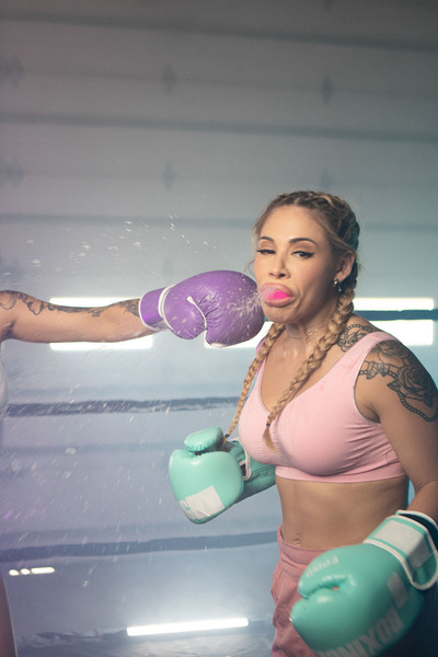 The dark-haired tranny bangs the naked cunt of a busty boxer in the boxing ring in various fuck posi…